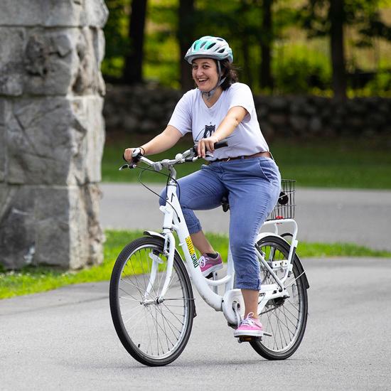 Hadia Bakkar with a bike at Skidmore College